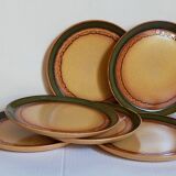 Six vintage stoneware plates with green net