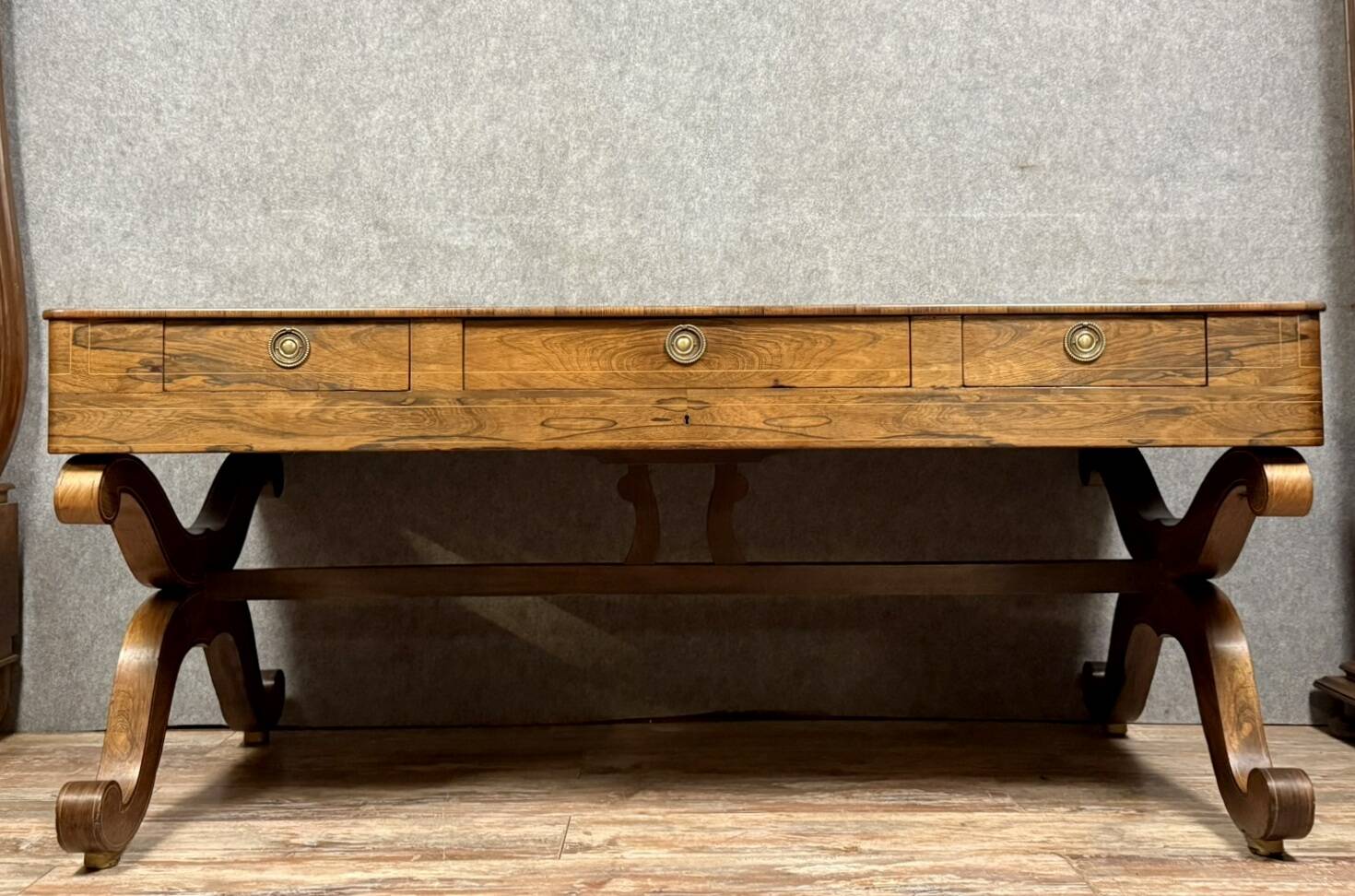 Very large Charles X period center desk in rosewood and lemonwood