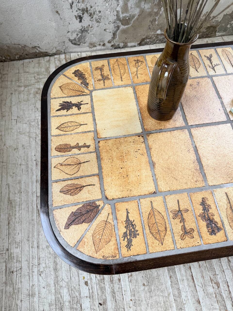 Capron “herbarium” oval coffee table