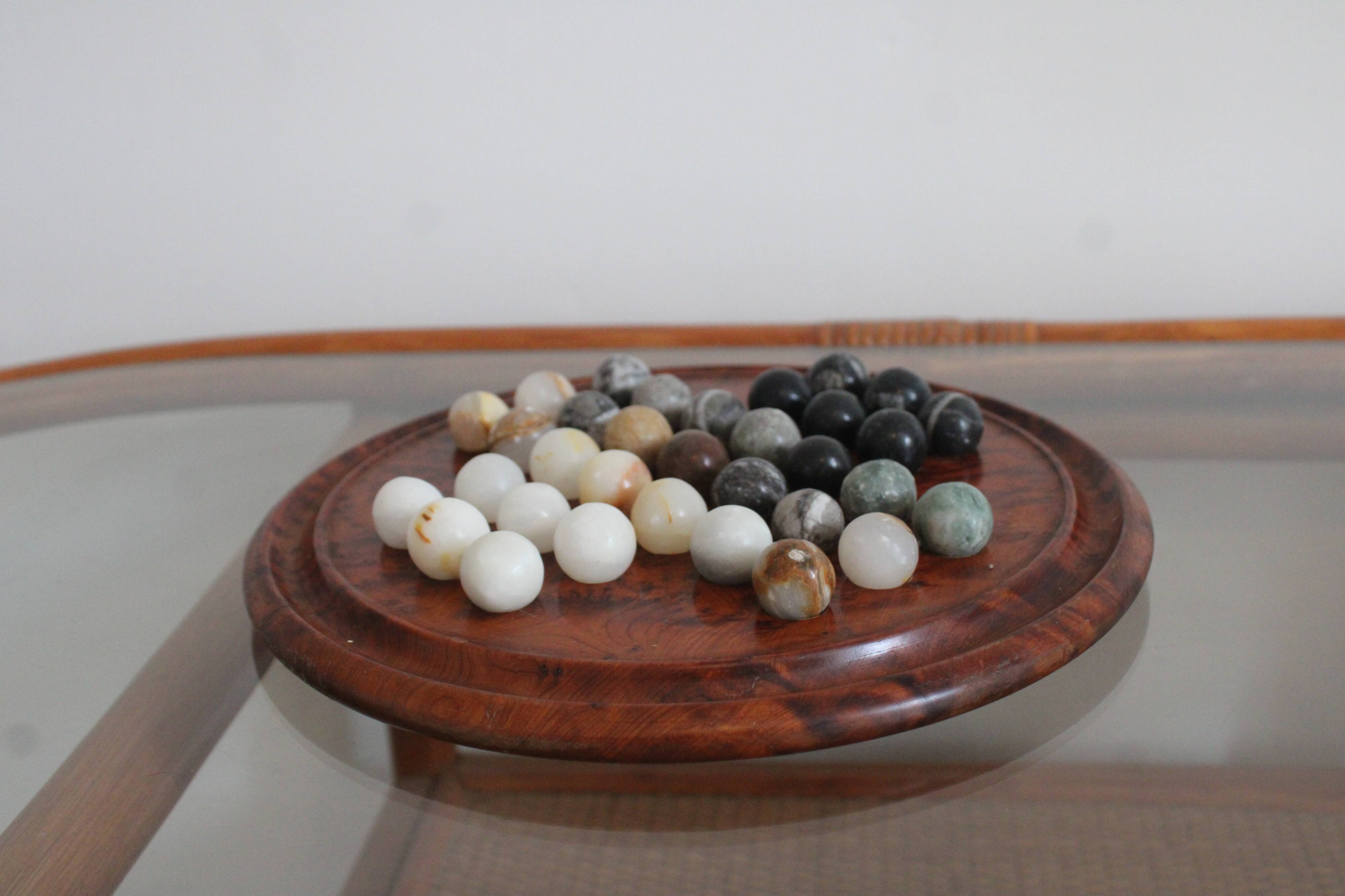 Solitaire game or mineral abacus