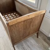 Baby cot in oak and caework