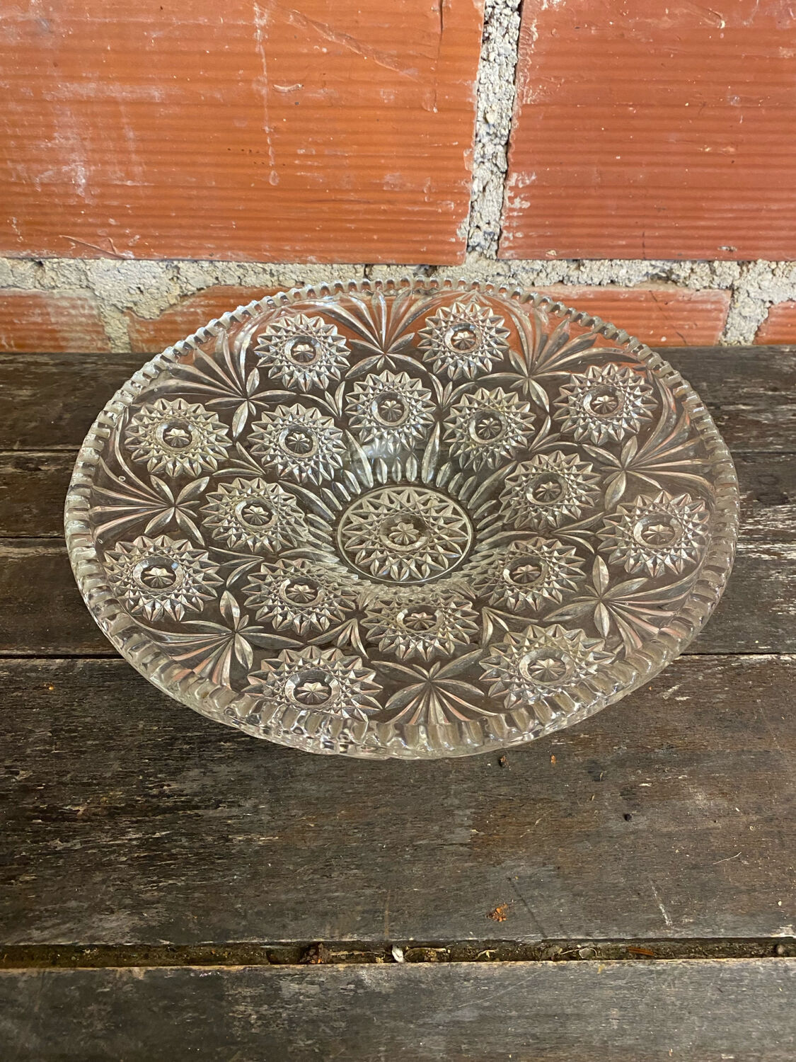 Cut glass fruit bowl with carved star decoration.