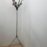 Wearing chrome parrot coat, black and multicolored balls