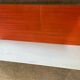 Pair of contemporary wall shelves in steel and stained wood