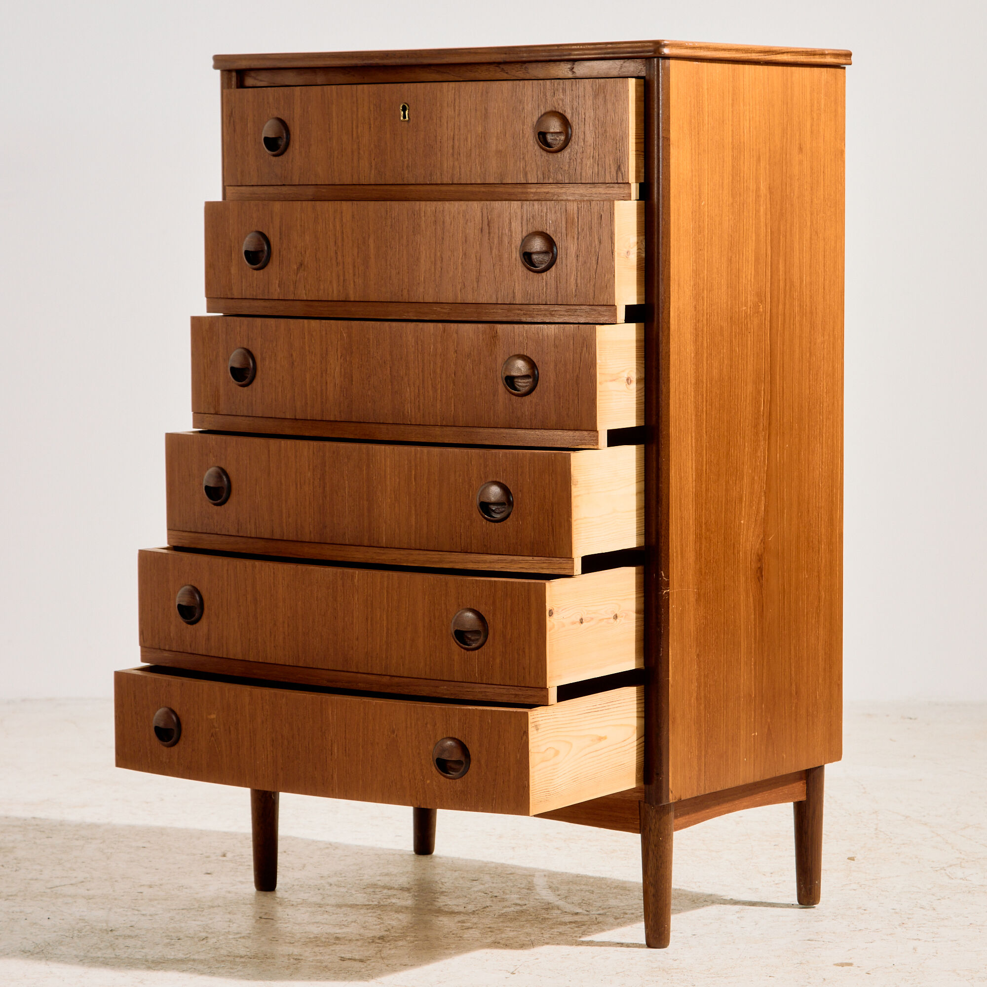 Teak chest of drawers with six drawers