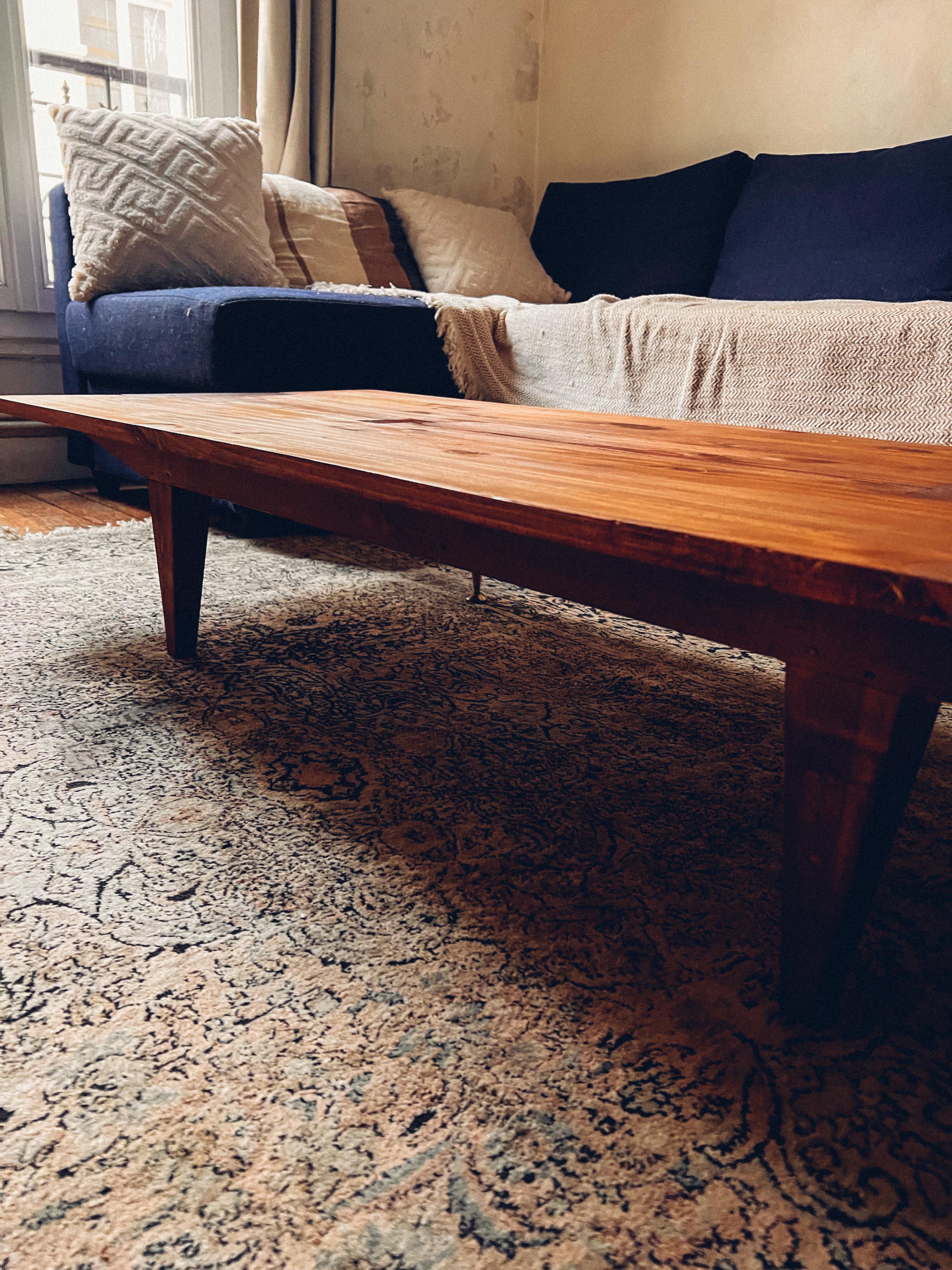 Coffee table in wood and brass