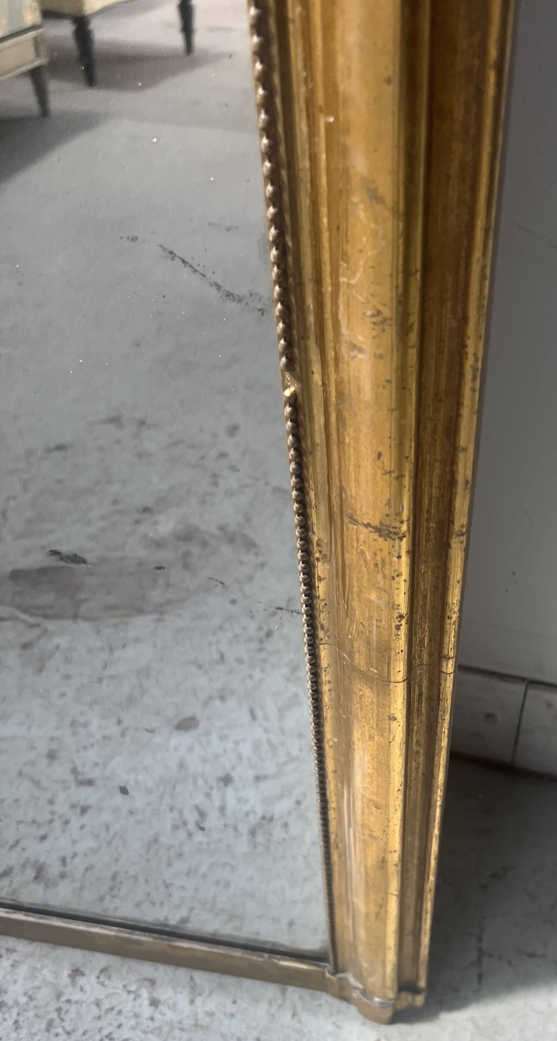 Louis XV style mirror in gilded wood and stucco