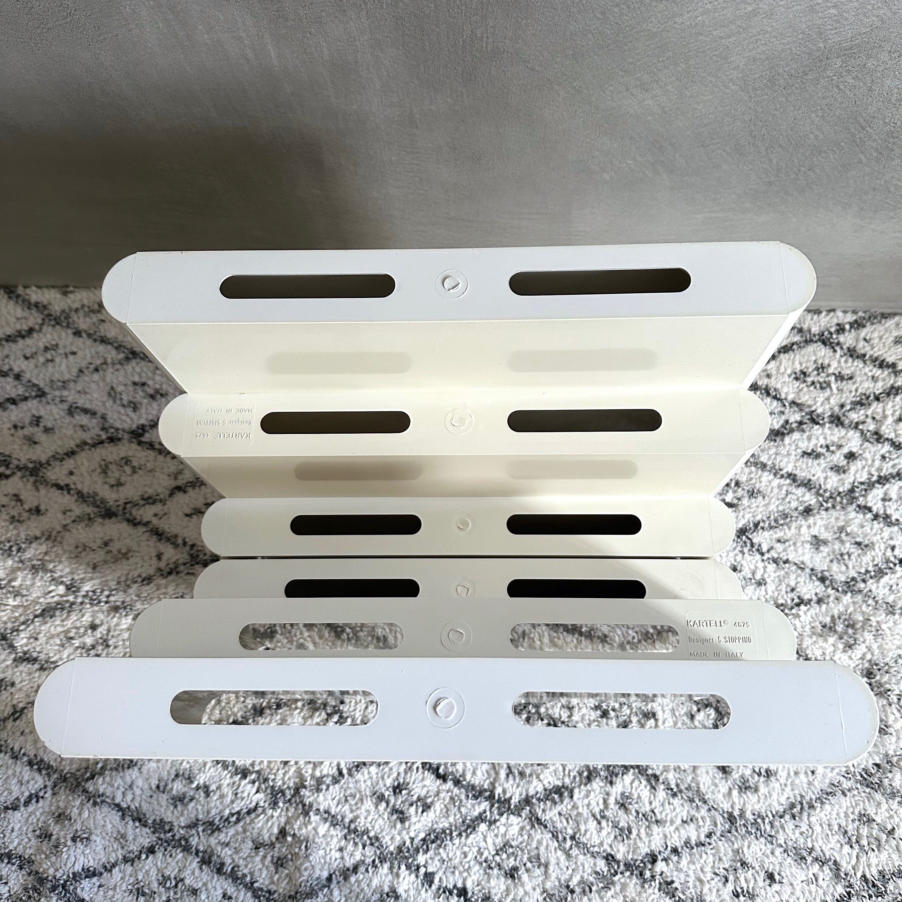 Kartell magazine rack by Giotto Stoppino
