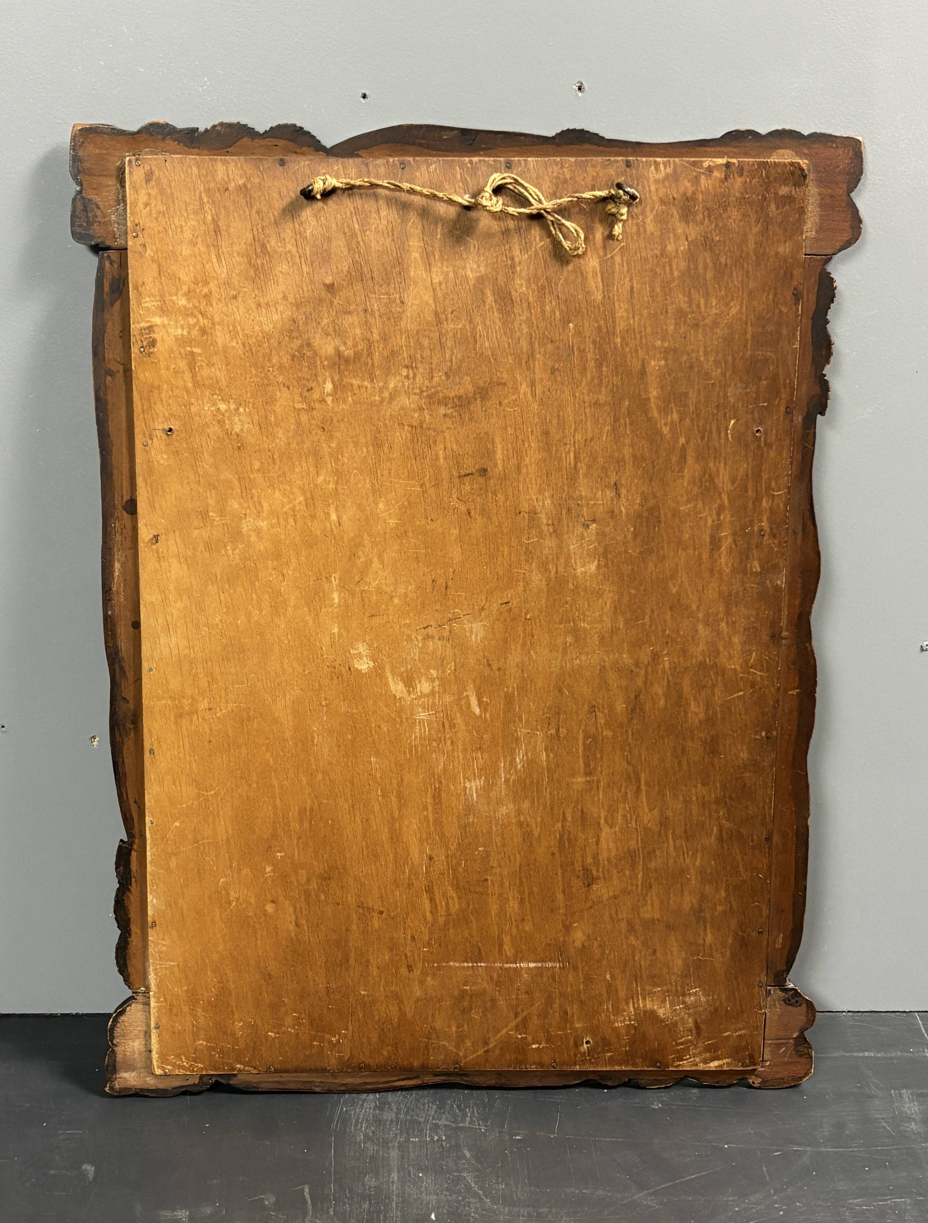 Arts & Crafts hand-carved wall mirror with floral roses, early 20th century