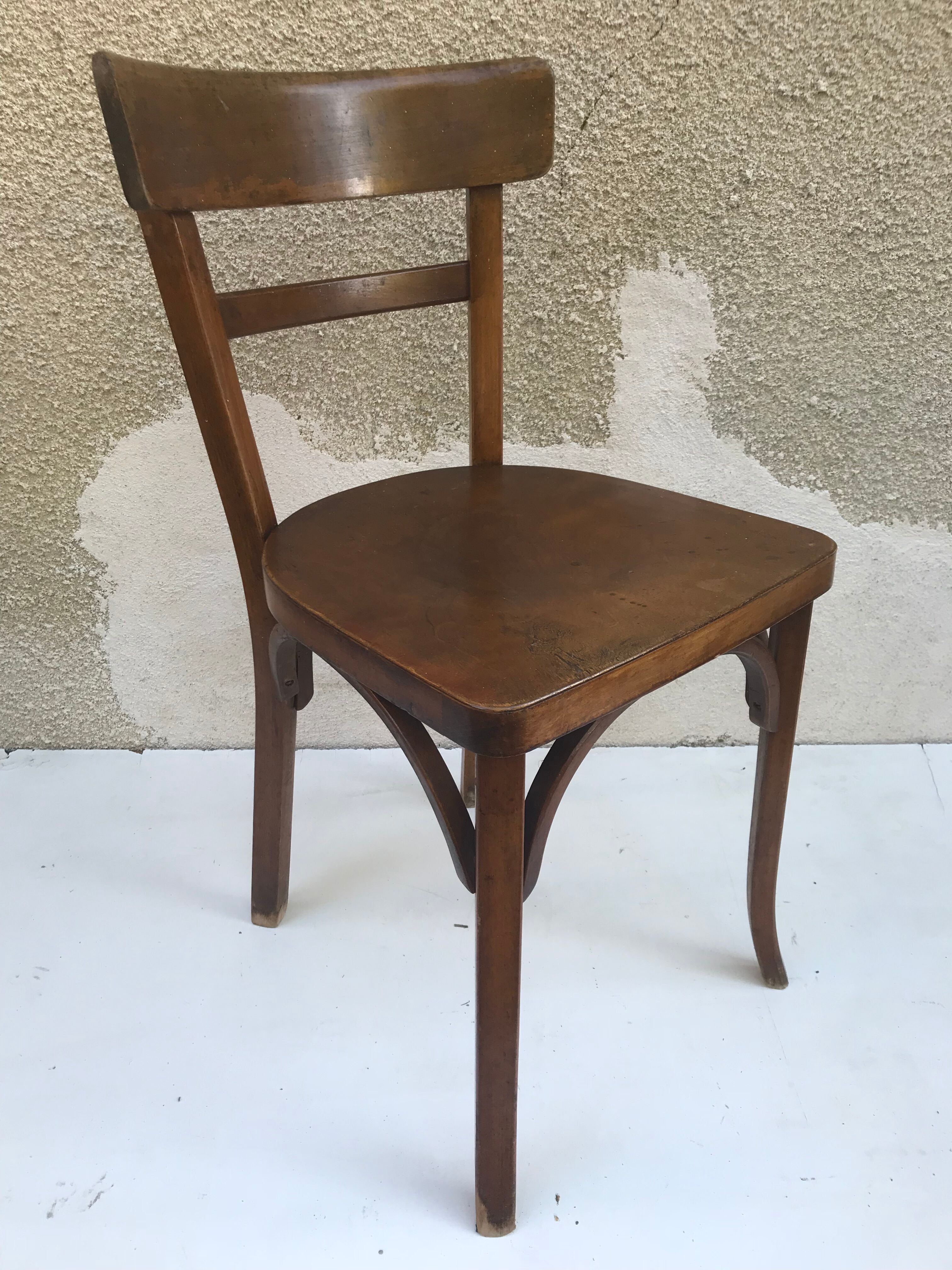 Serie de 4 chaises anciennes bistrot Baumann années 60