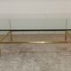 Coffee table glass and gold metal 80s