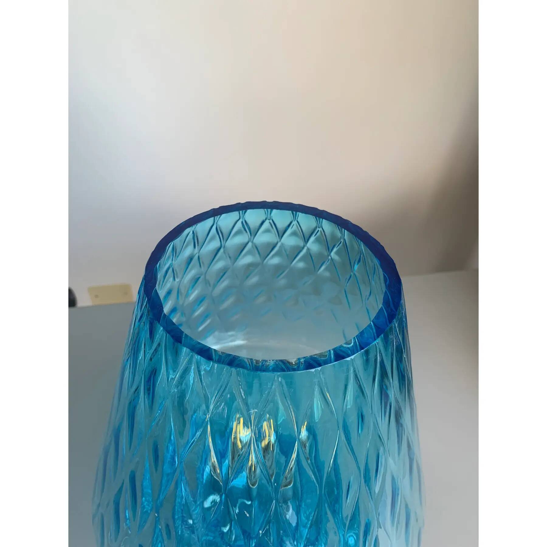 Light blue Murano-style glass with a balloton lamp.