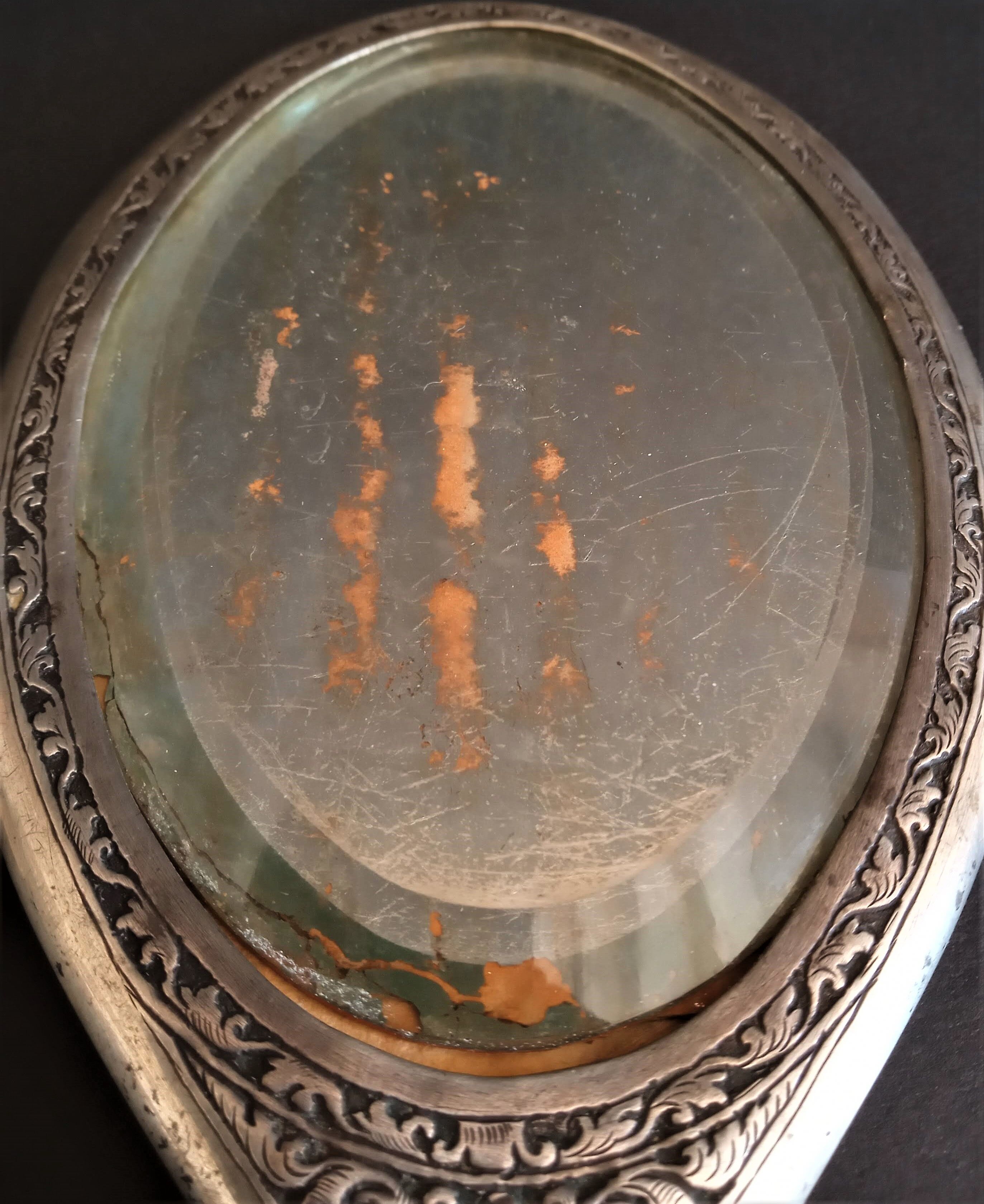 Silver beveled hand mirror