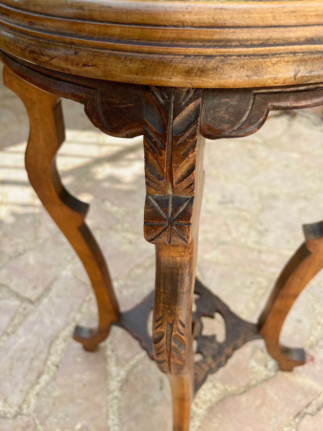 Old harness in wood with marble top