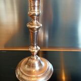Chiseled candlestick in gilded bronze