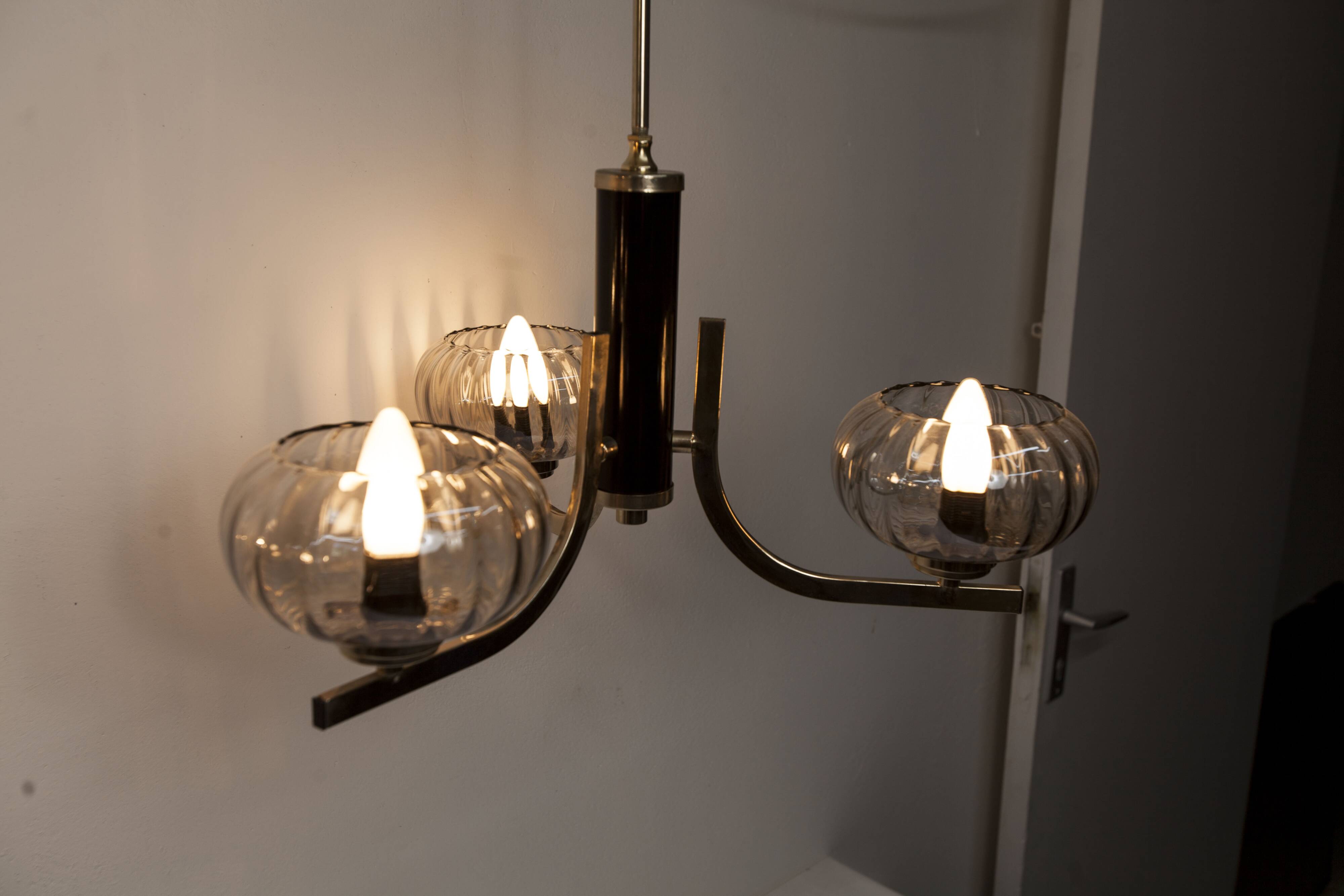 See Delmas chandelier, 3 arms, black and gold, clear glass, 1960