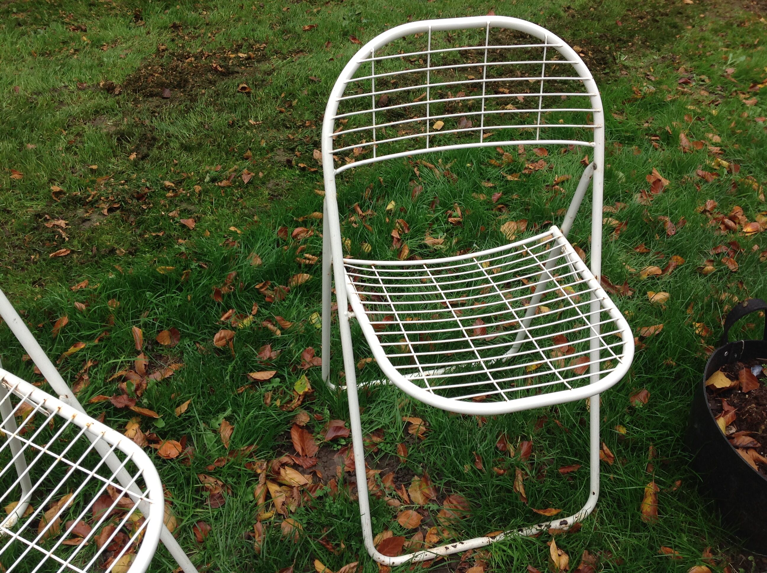 Trio of folding metal chairs