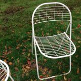 Trio of folding metal chairs