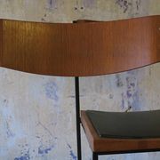 Pair of teak and iron stacking chairs, 1960s