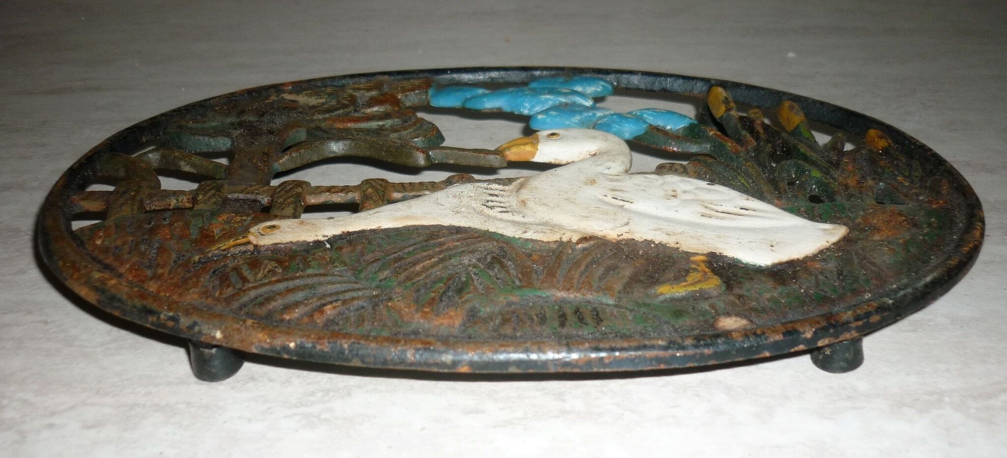 Underside of flat couple of steel geese