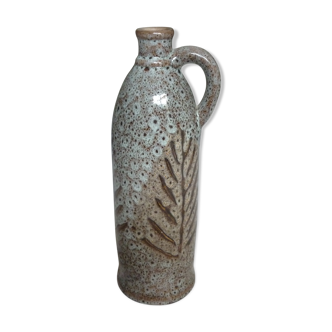 Bottle in sandstone with Cove décor sheets signed