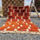 Large Moroccan Berber rug in orange and ecru wool, 400 x 300 cm.