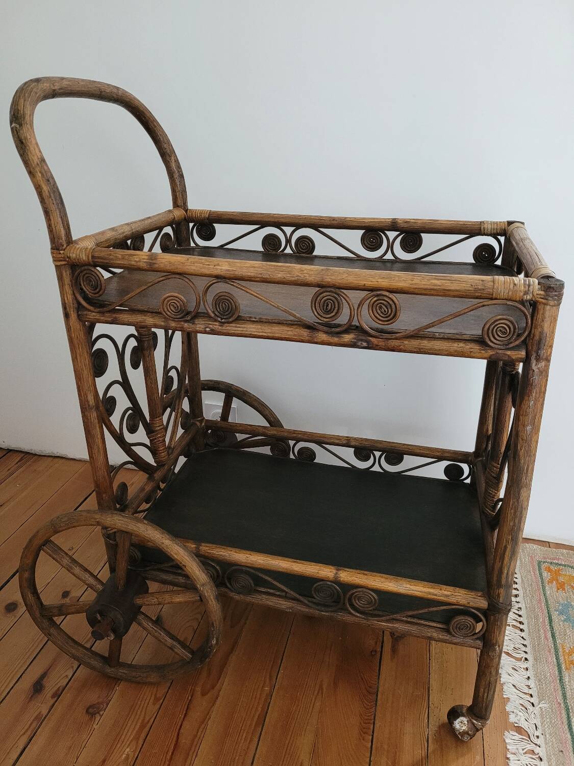 Bamboo and rattan dessert table in peacock style.