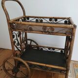 Bamboo and rattan dessert table in peacock style.