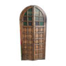 Ancient Indian door curved with colorful stained glass windows