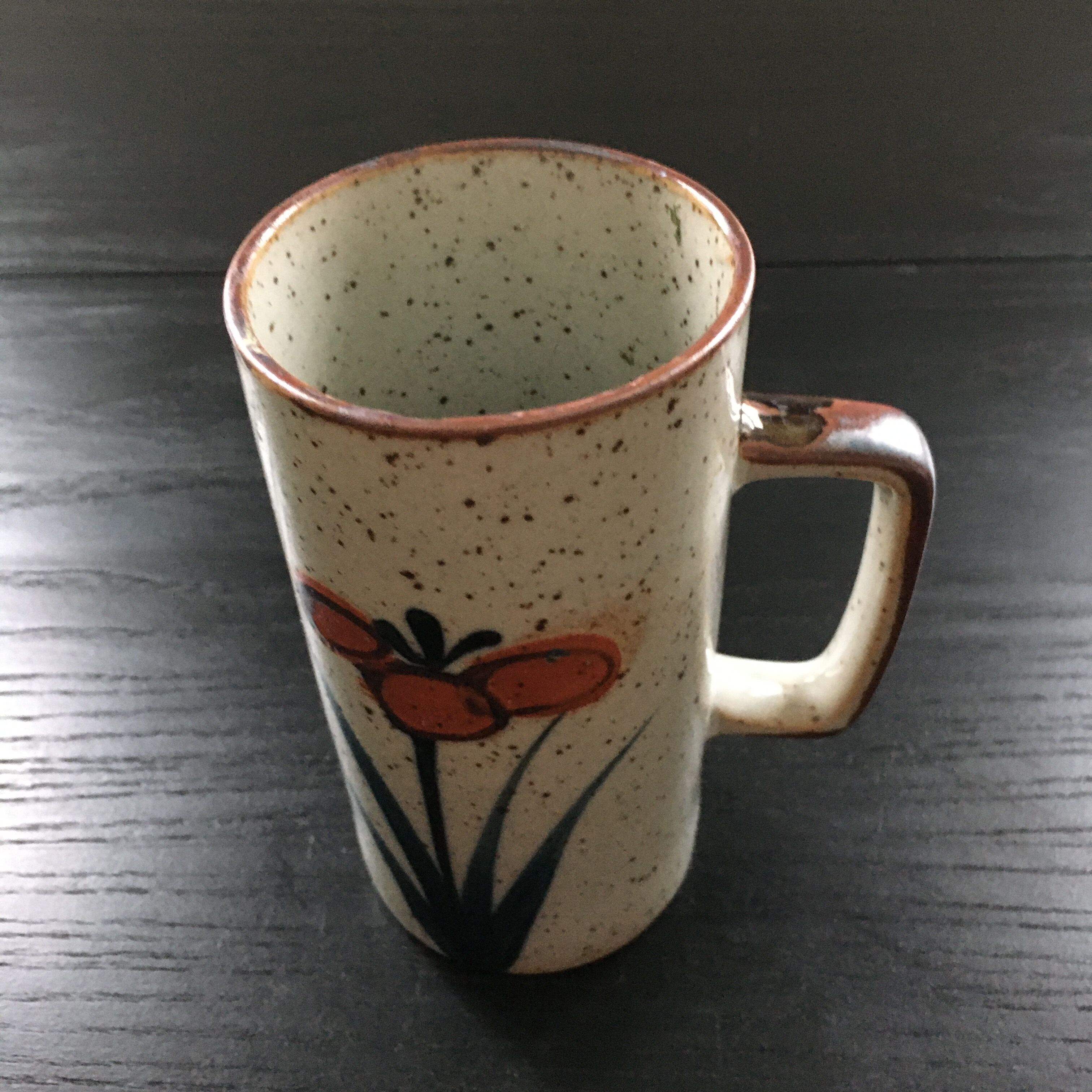 Stoneware mug with floral decoration