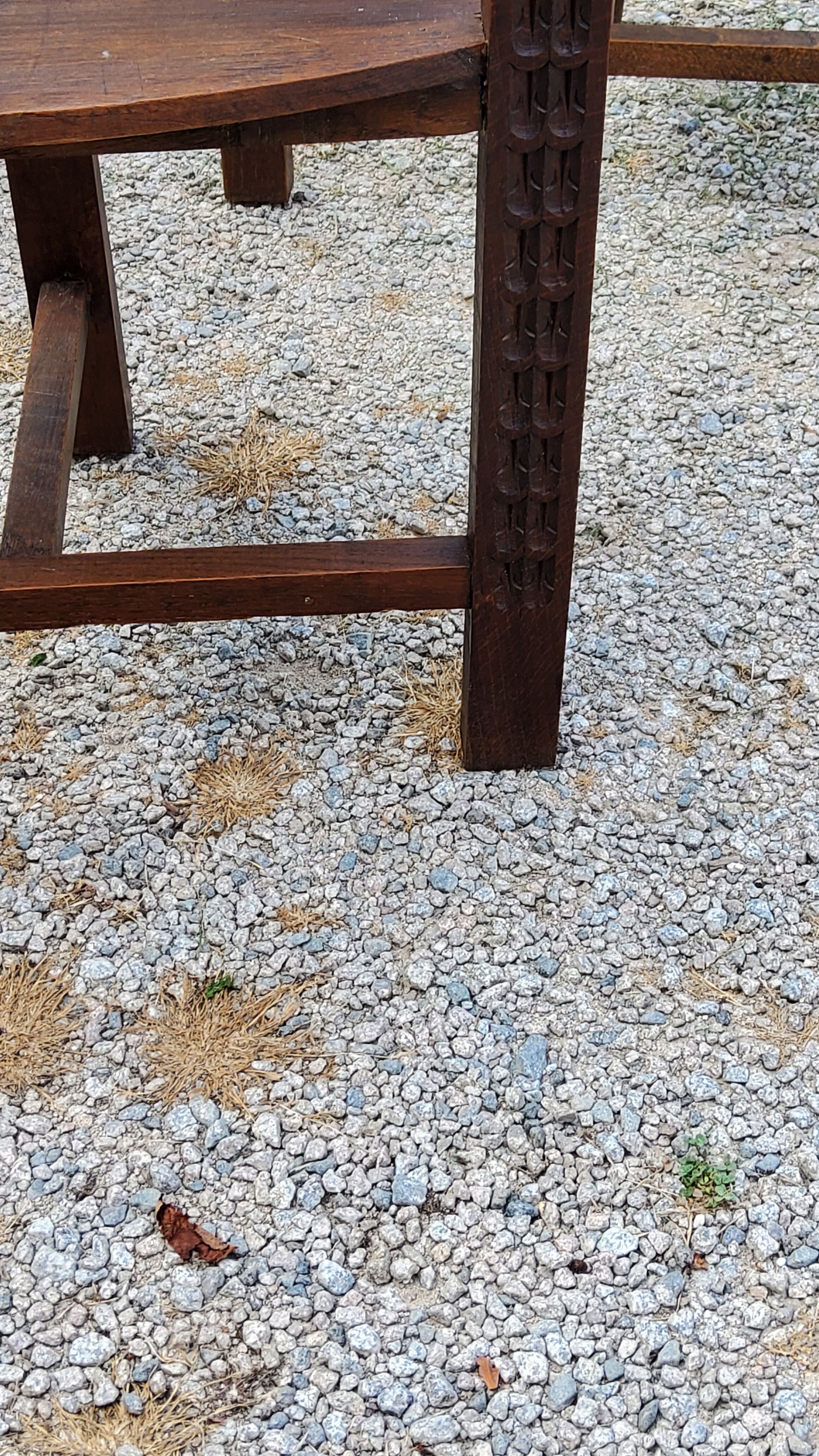 Set of three brutalist tripod armchairs in carved solid oak