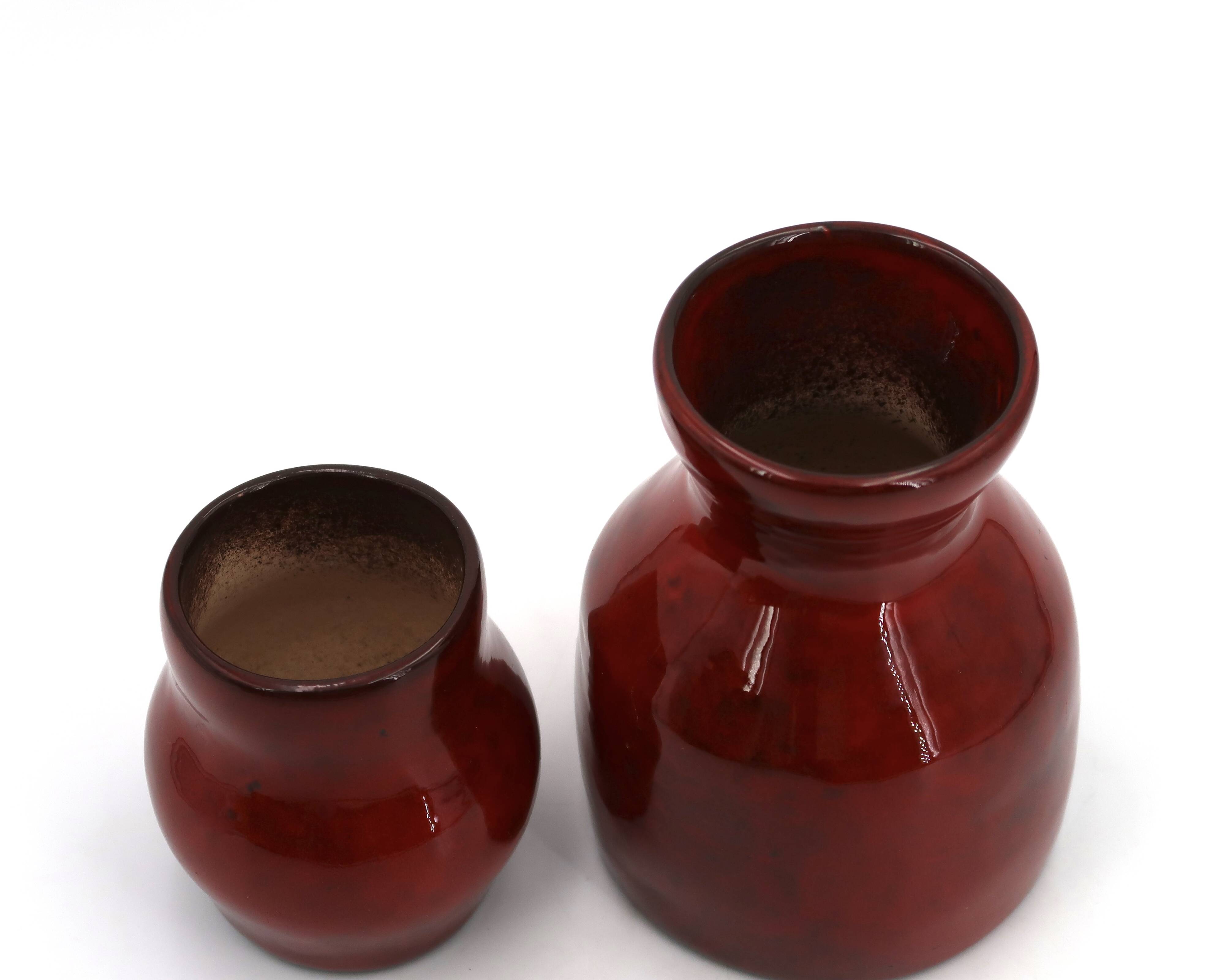 Deux vases rouge sang de boeuf en céramique de Max Idlas, années 60