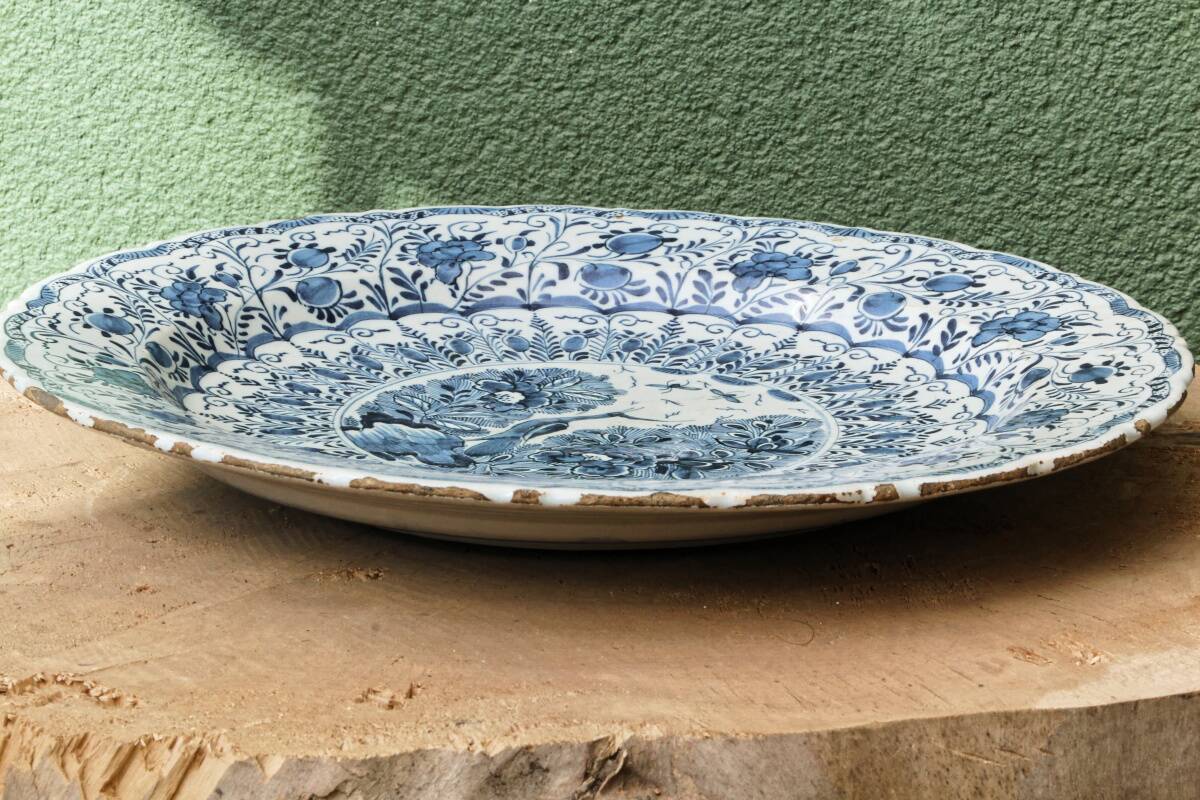 Delft earthenware dish, signed the porcelain label