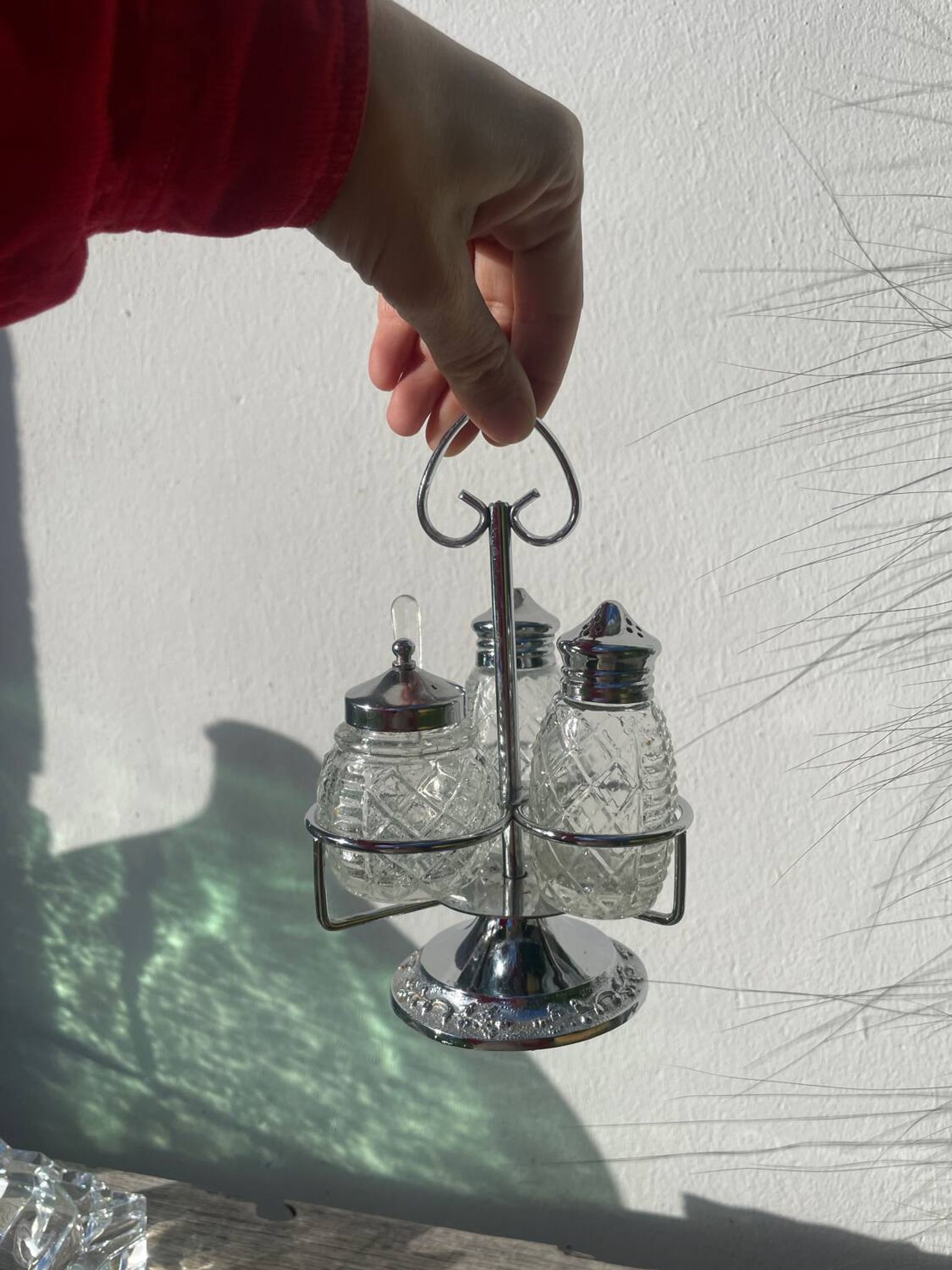 Silver-plated metal and glass salt and pepper shakers