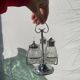 Silver-plated metal and glass salt and pepper shakers