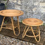 Pair of tripod coffee tables in rattan from the 1950s.
