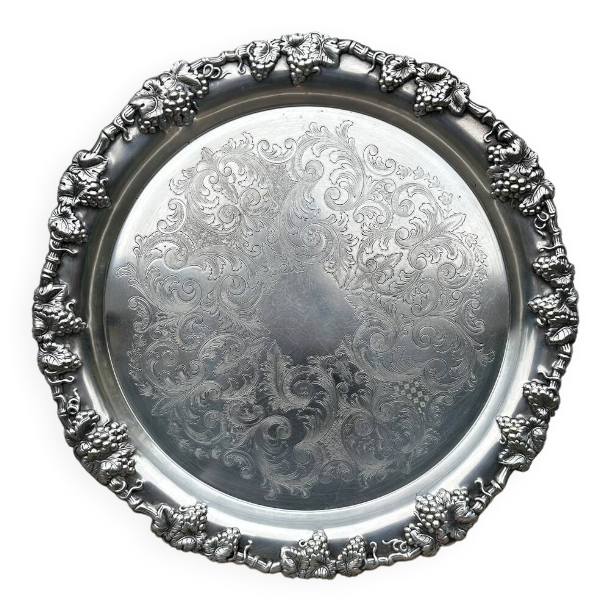 Antique round silver serving platter, grape motifs.