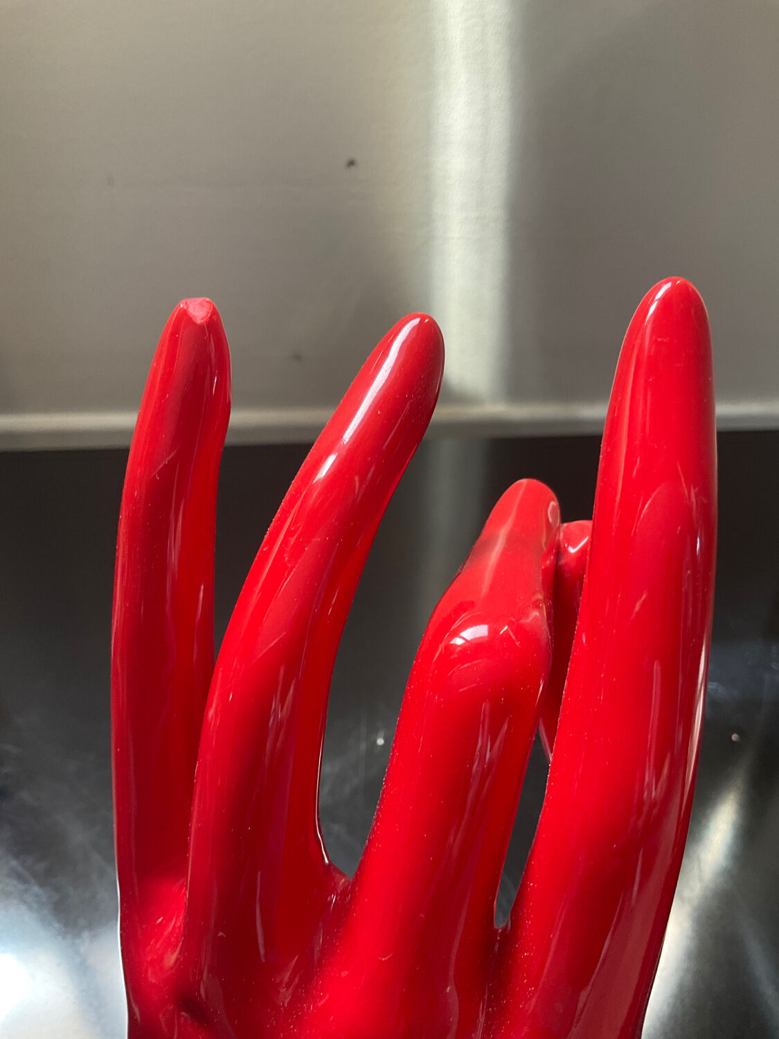 Vintage red ceramic hand paperweight
