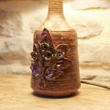 Sandstone lamp base decorated with flowers