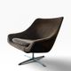 Brown vintage armchair/chair on a star base.