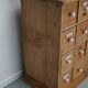 Antique German Pine Apothecary Cabinet with Enamel Shields, 1900s