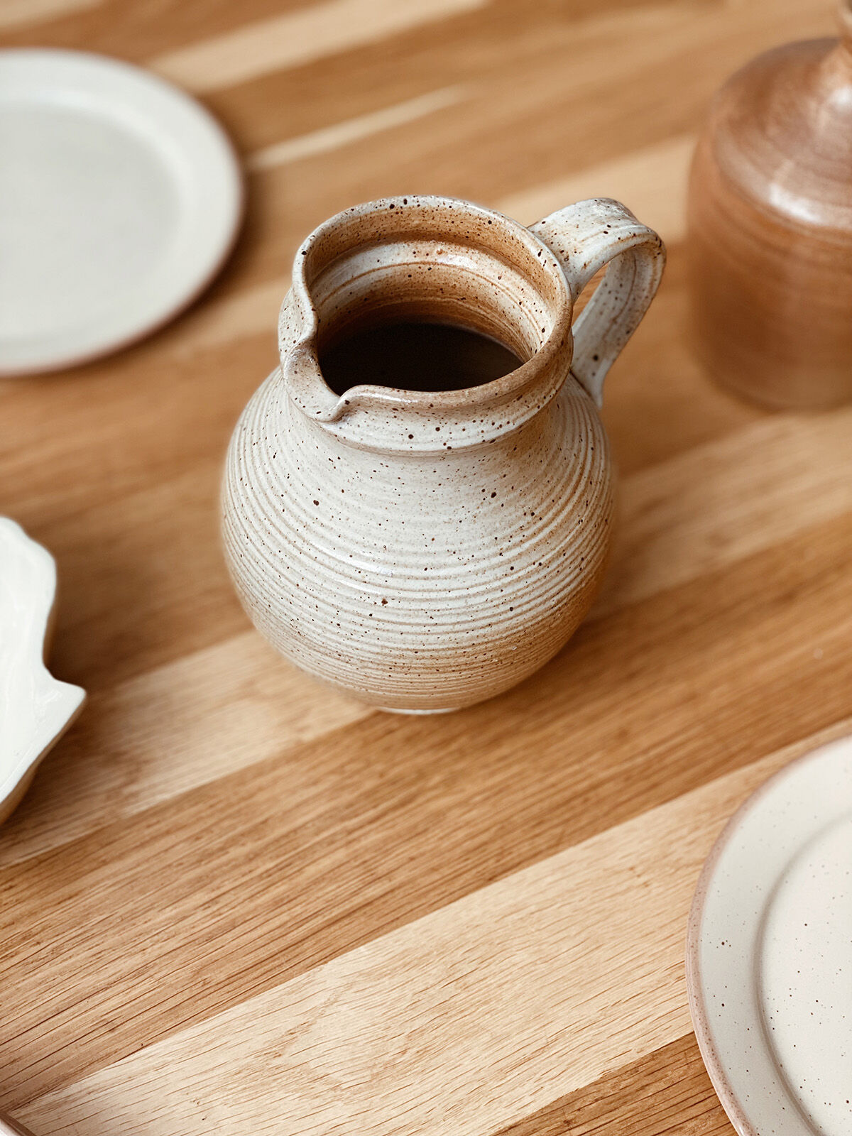 Beige stoneware pitcher
