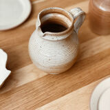 Beige stoneware pitcher