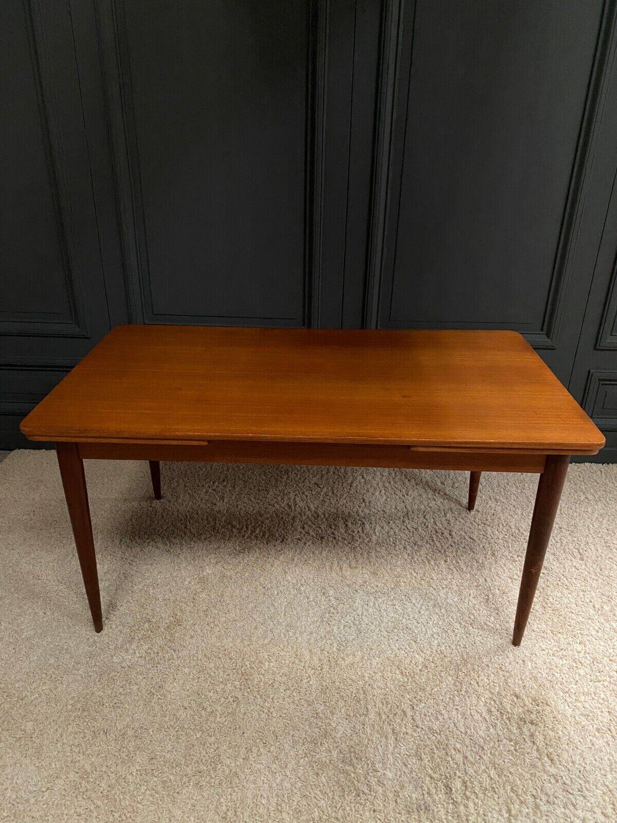 Scandinavian rectangular teak dining table with 4 tapered legs