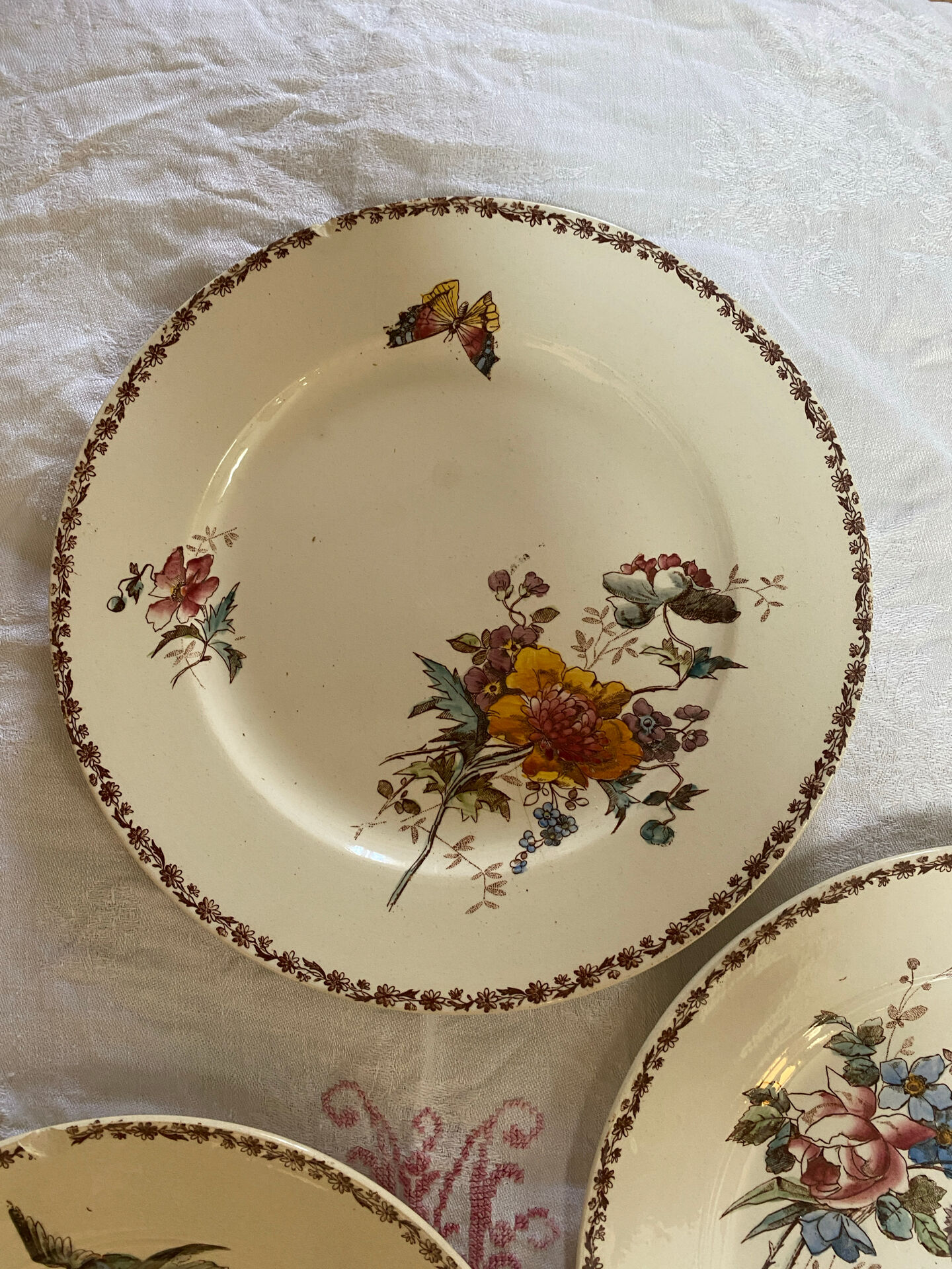 Set of 3 flat plates in polychrome ironstone E. Bourgeois