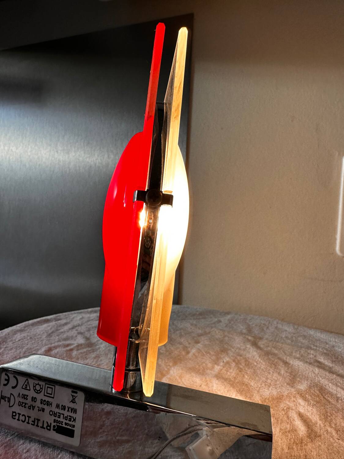 Pair of red Keplero model wall lights, design by chiaramonte