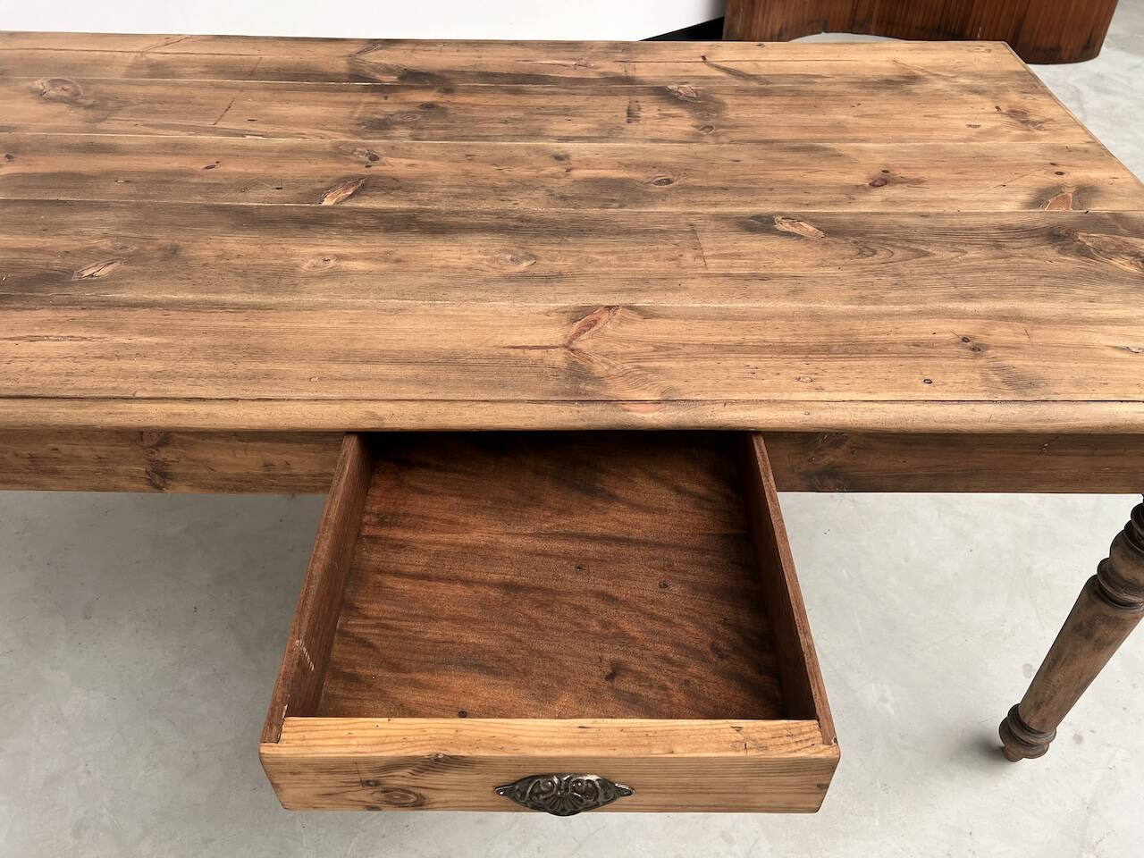Antique farm table from the 1950s, with 3 drawers and turned legs