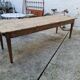 Large antique farmhouse table with a drawer