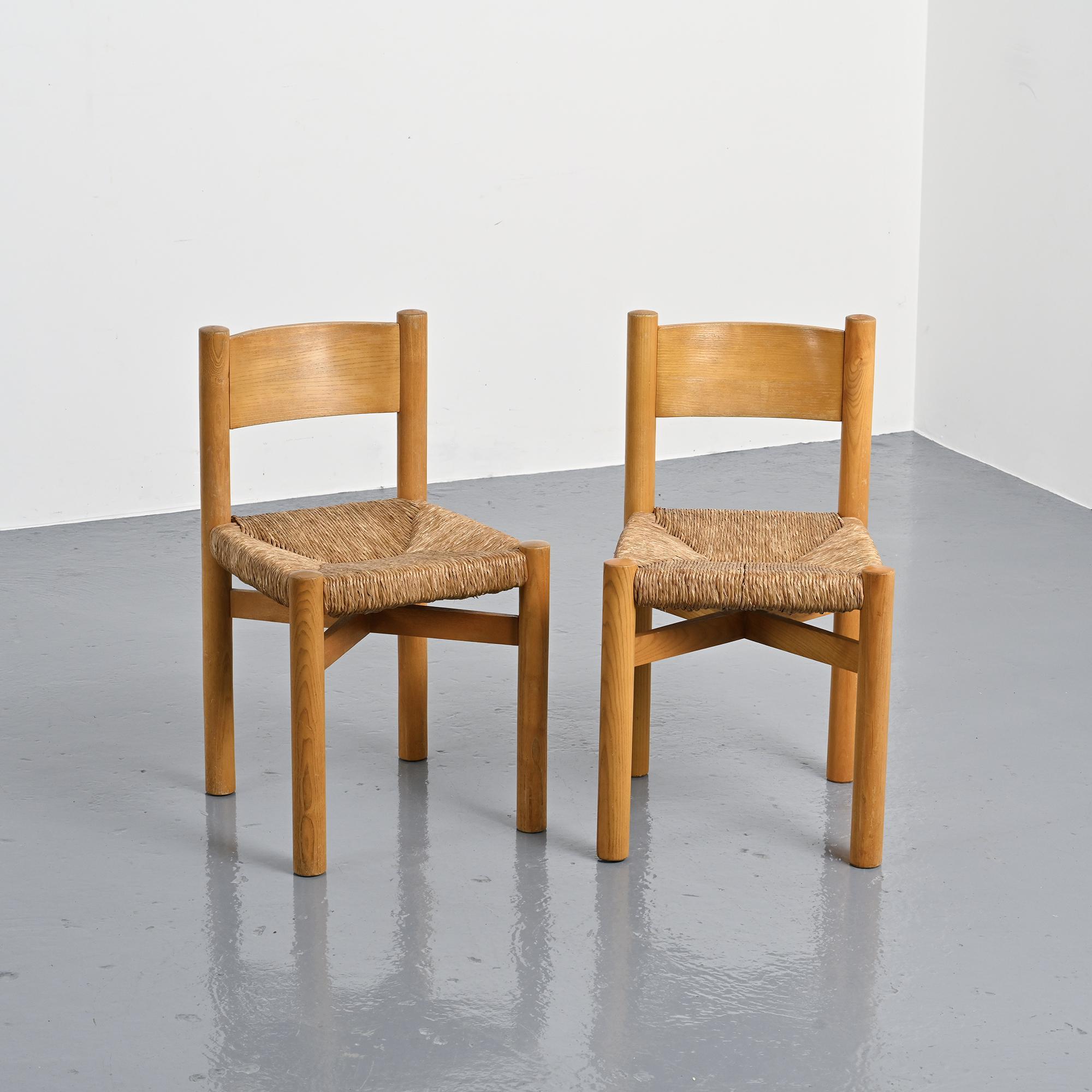 Pair of Méribel chairs by Charlotte Perriand, circa 1955.