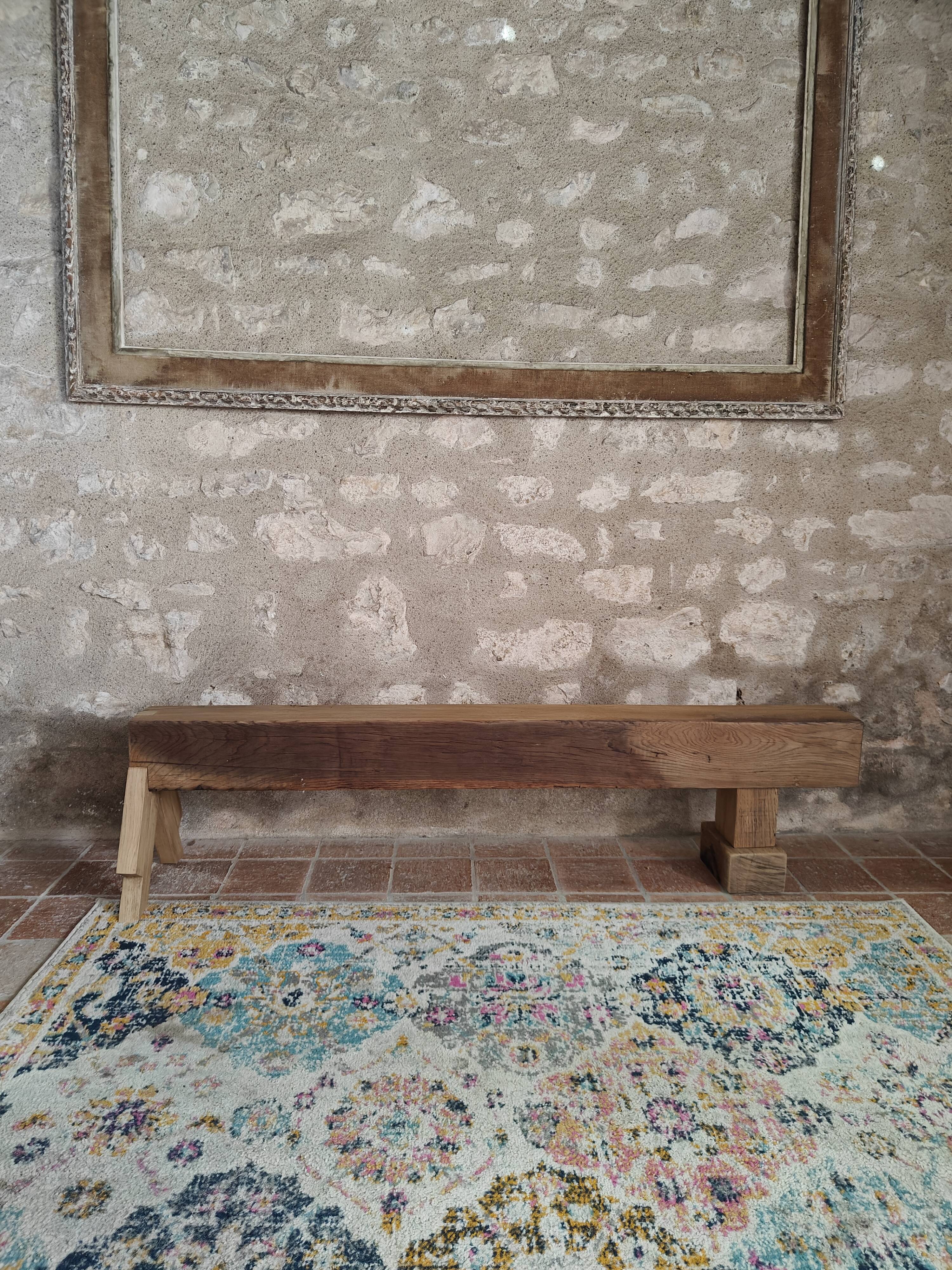 Solid oak bench with asymmetrical legs